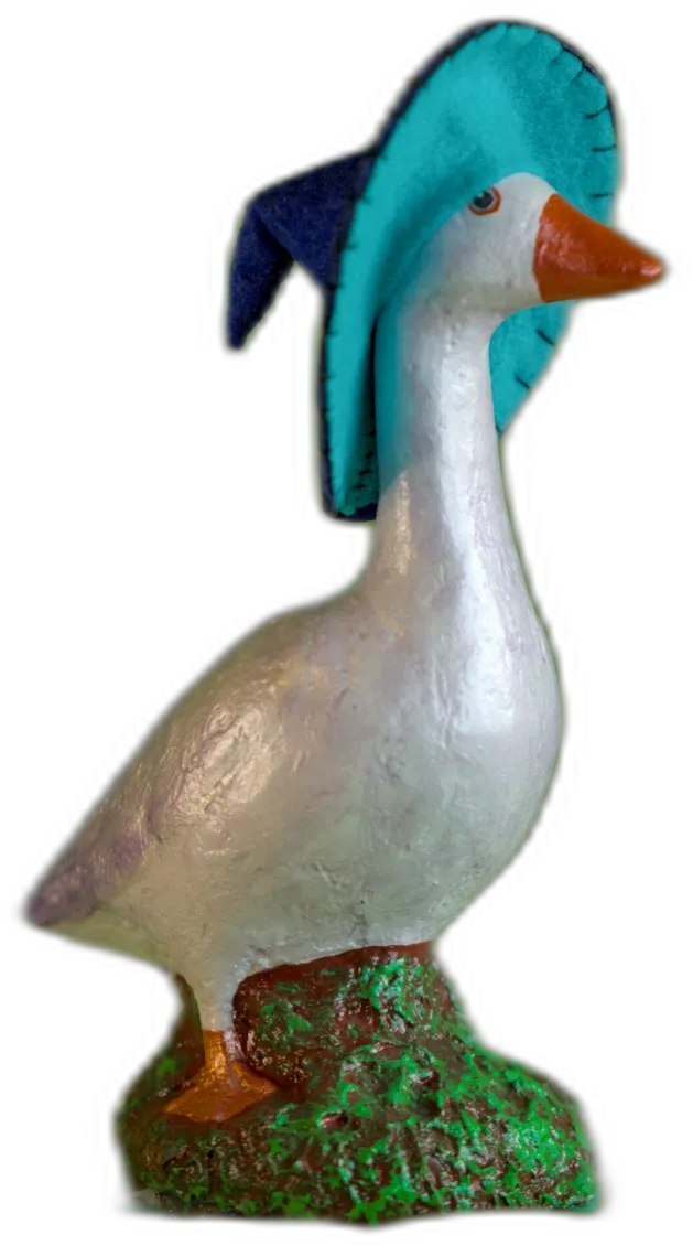 Close-up of a Critter garden goose wearing a teal hat